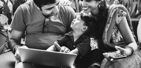 Indian family using a laptop together